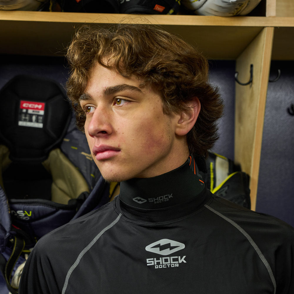 Lifestyle Image of Youth Hockey Player Wearing Shock Doctor Ultra 2.0 Neck Guard