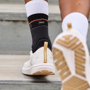 Detail View of Shock Doctor Compression Knit Ankle Sleeve with Gel Support - On Model - Back View