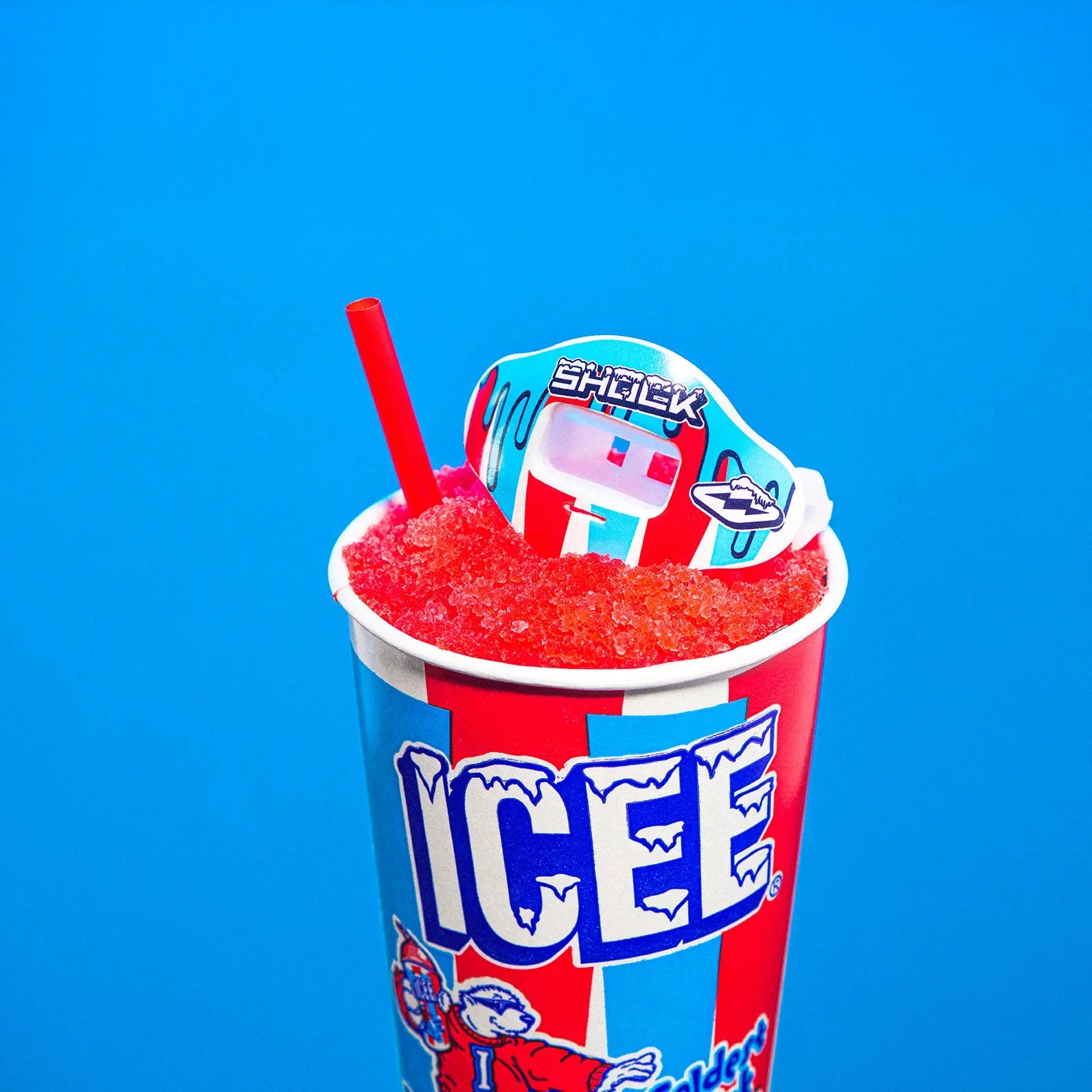 ICEE Drip Max AirFlow Mouthguard - Sitting on ICEE Cherry Flavor Cup