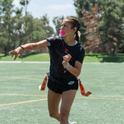 Youth Female Flag Football Athlete Wearing Shock Doctor Translucent Pink Max AirFlow Football Lip Guard