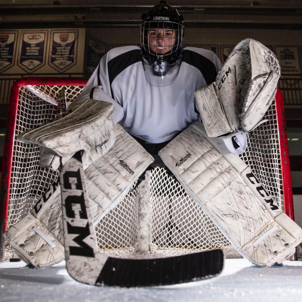 Lifestyle Shot of Female Hockey Goalie Wearing Shock Doctor Pelvic Protector
