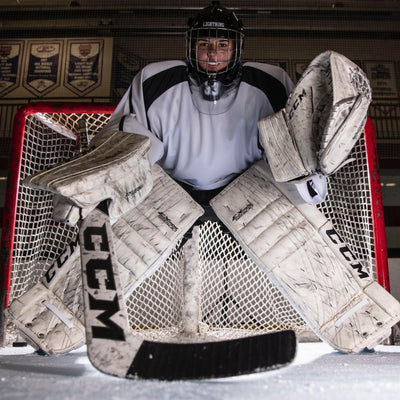 Lifestyle Shot of Female Hockey Goalie Wearing Shock Doctor Pelvic Protector