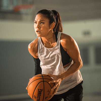 Female Basketball Player Wearing Trash Talker Mouthguard about to Shoot a Free Throw