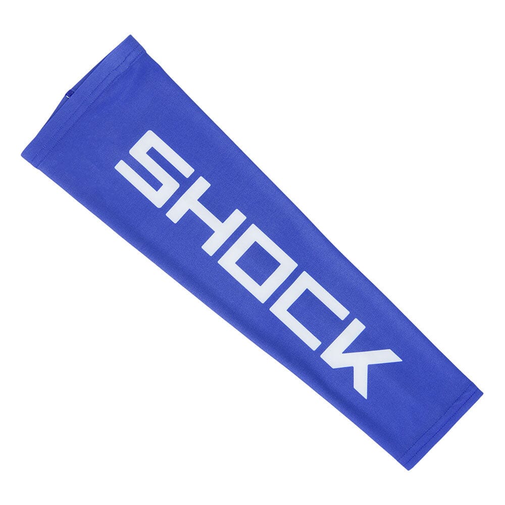 Blue Shock Doctor Compression Arm Sleeve designed for sports, offering muscle warmth, skin protection, and moisture-wicking performance.