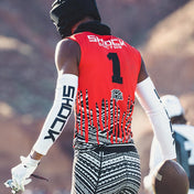 Youth 7v7 Football Player Wearing White Shock Doctor Compression Arm Sleeve