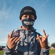 Youth 7v7 Football Athlete Wearing Shock Doctor Black Performance Headband As Face Covering
